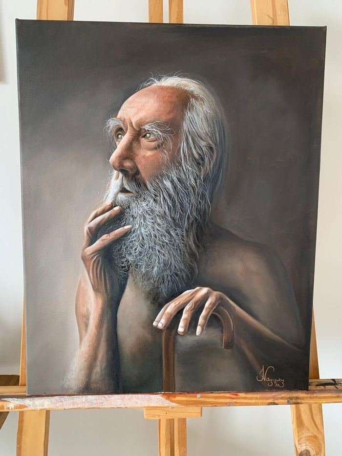 Óleo de un hombre anciano de barba blanca, con la mano en el mentón