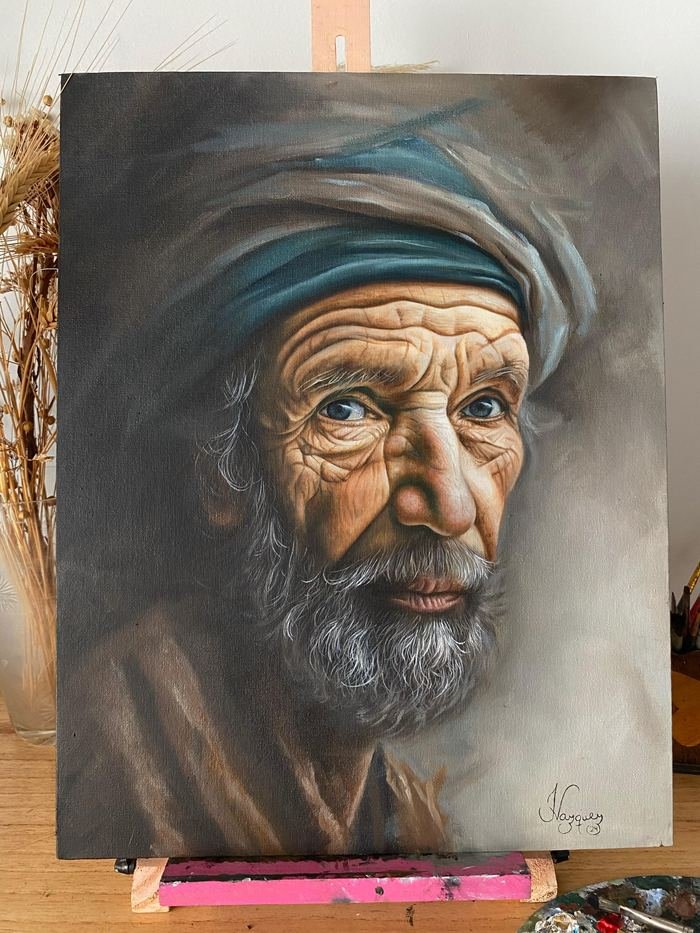 Óleo de un hombre mayor con turbante turquesa y rostro curtido
